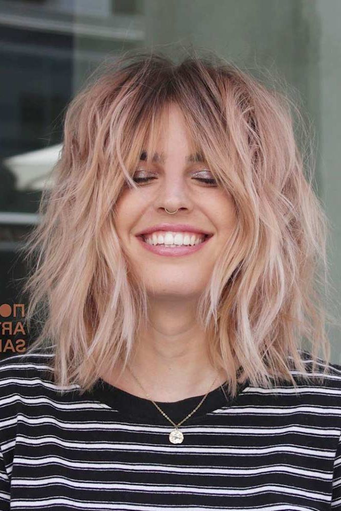 Most Up To Date Blonde Razored Lob With Full Bangs Regarding Layered Bob Haircuts & Why You Should Get One In  (View 6 of 15)