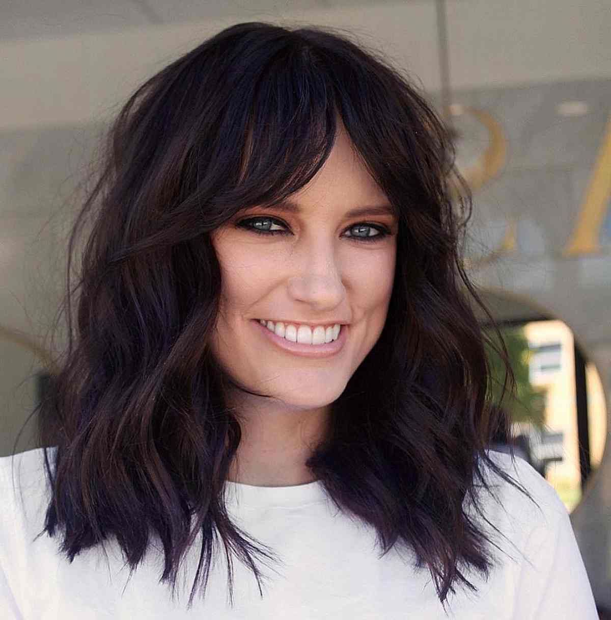 Newest Wavy Cut With Curtain Bangs Throughout Pairing Curtain Bangs With Wavy Hair? 22 Best Ways To Do It (Gallery 9 of 20)