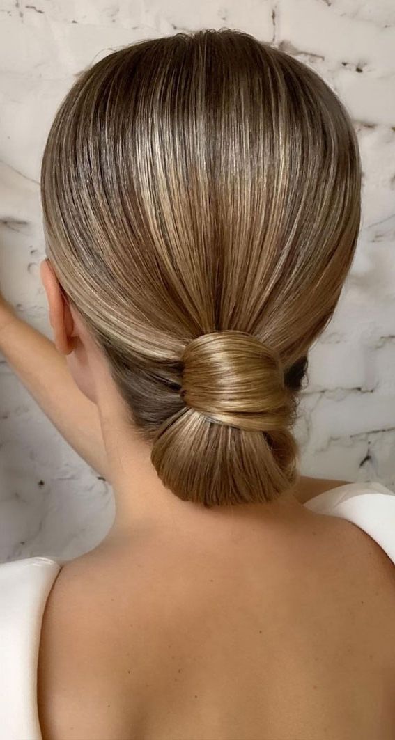 Popular Low Bun For Straight Hair Throughout 57 Different Wedding Hairstyles For Any Length : Sleek Wrap Low Bun (View 12 of 15)