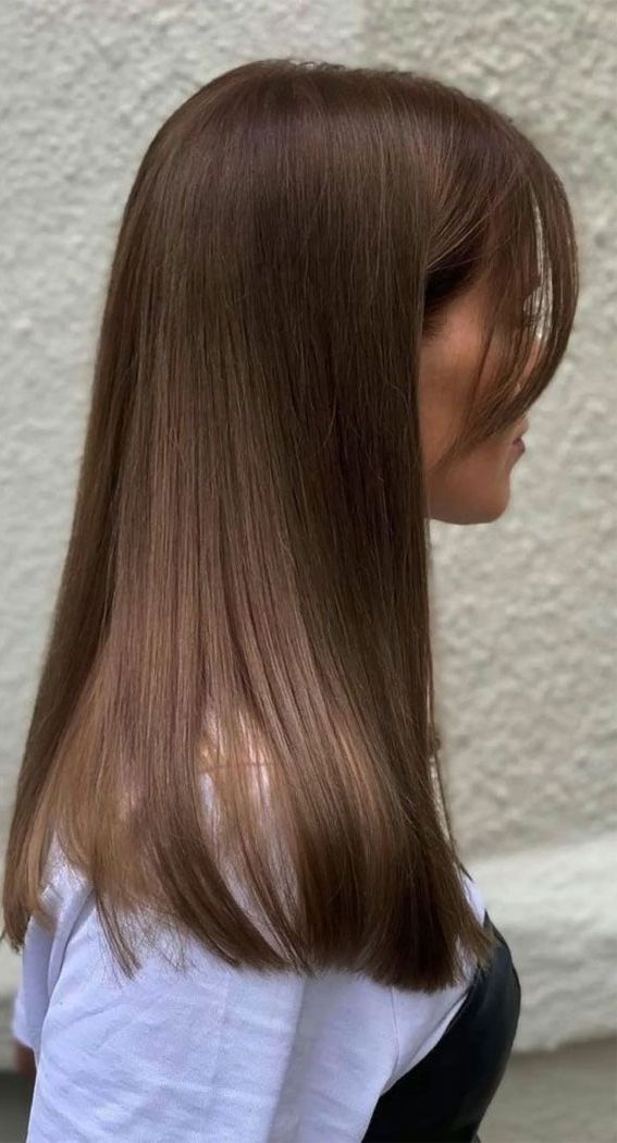 Trendy Classy Brown Medium Hair Within 50 Stylish Brown Hair Colors & Styles For 2022 : Medium Warm Brown With  Curtain Bangs (View 11 of 15)