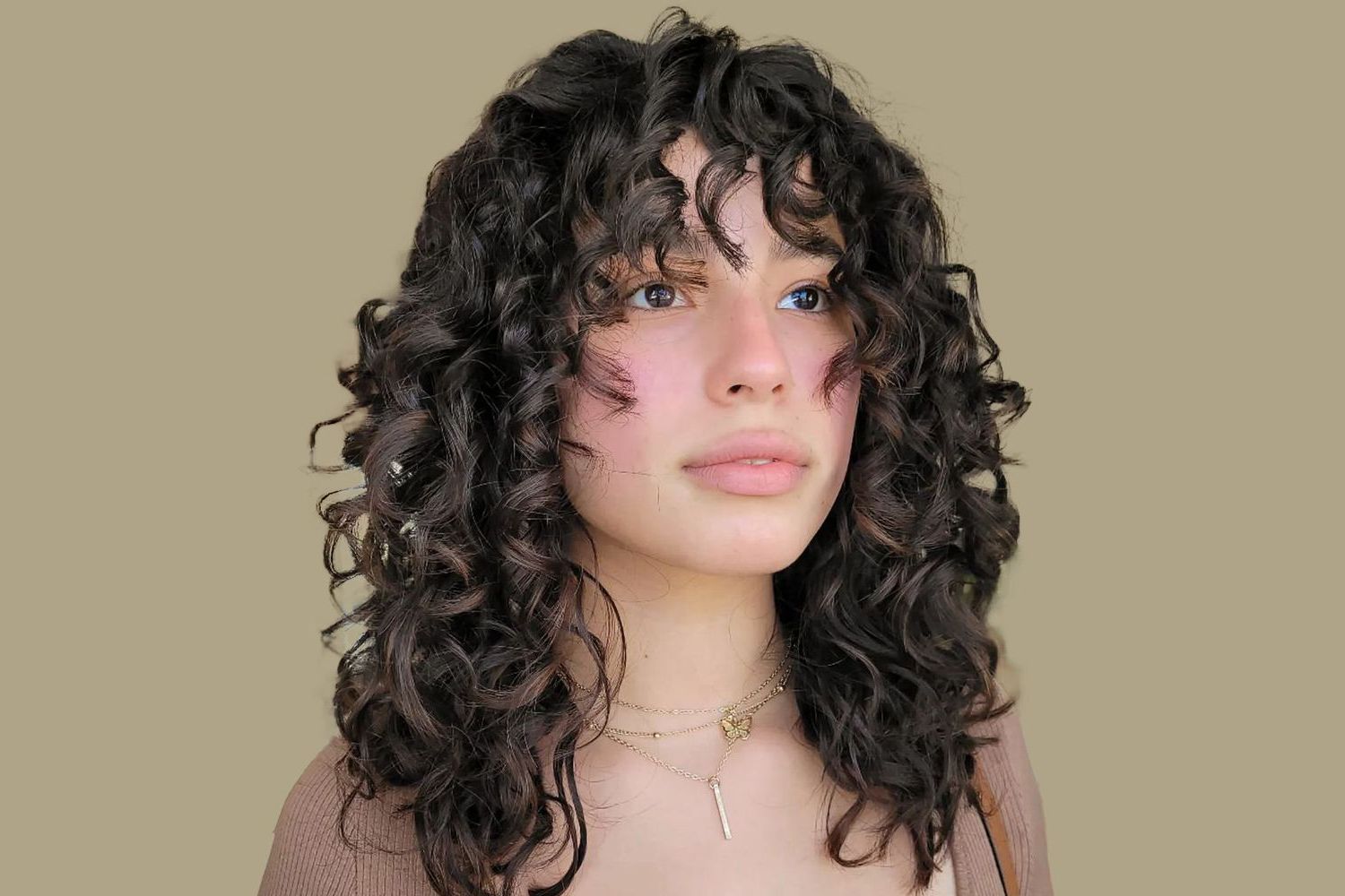 Trendy Slightly Curly Hair With Bangs Pertaining To Your Complete Guide To Getting Bangs With Curly Hair (Gallery 4 of 15)