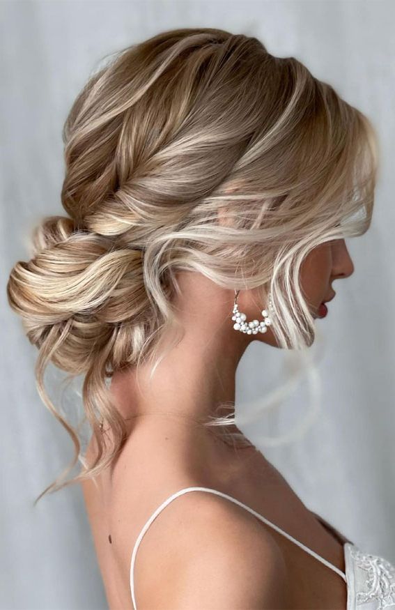 Well Liked Low Formal Bun Updo Inside Sophisticated Updos For Any Occasion – Pretty, Effortless Low Bun (View 12 of 15)