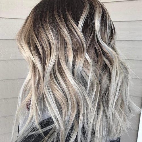 Dark Roots And Icy Cool Ends Blonde Hairstyles (Photo 13 of 20)