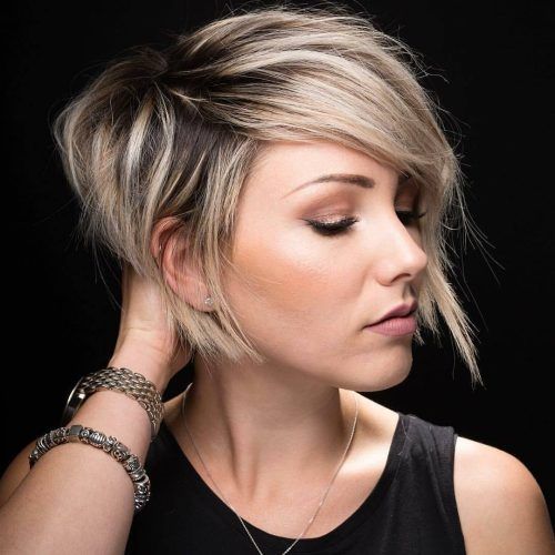 Layered Pixie Hairstyles With An Edgy Fringe (Photo 17 of 20)