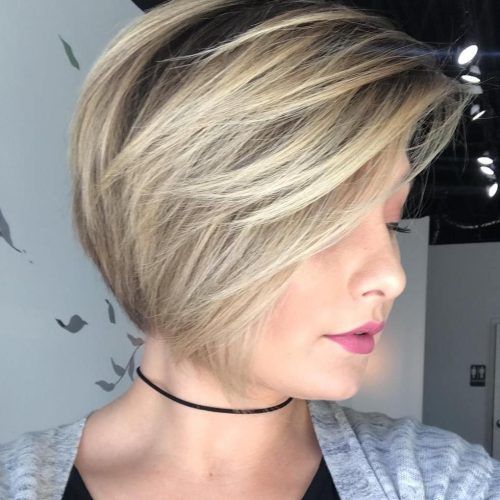 Short Ash Blonde Bob Hairstyles With Feathered Bangs (Photo 14 of 20)