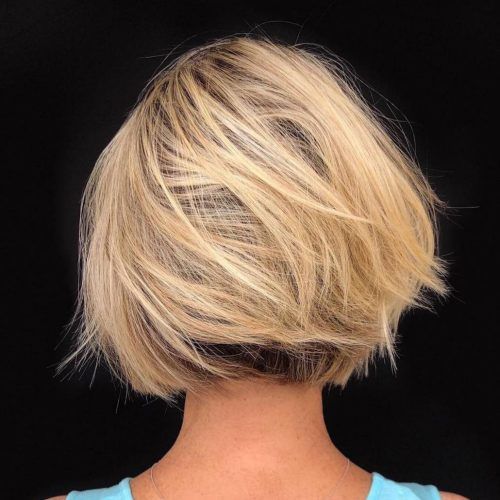 Dynamic Tousled Blonde Bob Hairstyles With Dark Underlayer (Photo 1 of 20)
