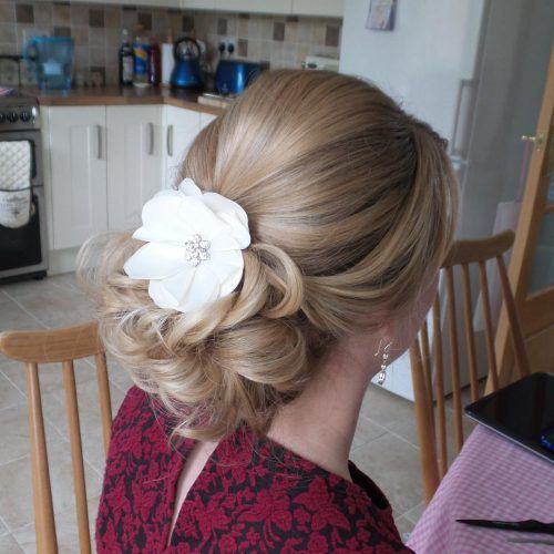Sculpted Orchid Bun Prom Hairstyles (Photo 13 of 20)