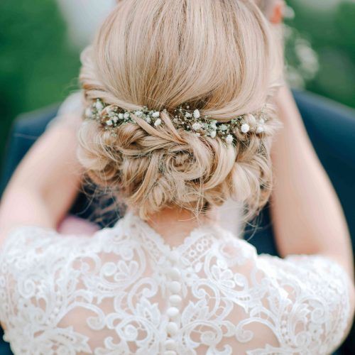 Romantic Florals Updo Hairstyles (Photo 11 of 20)
