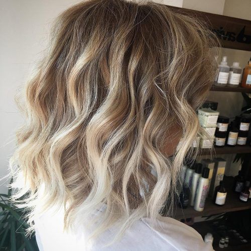 Icy Highlights And Loose Curls Blonde Hairstyles (Photo 15 of 20)