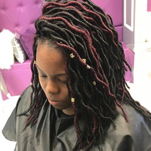 Tightly Coiled Gray Dreads Bun Hairstyles (Photo 1 of 20)