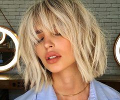 20 Best Elongated Feathered Bangs Hairstyles with Edgy Mob