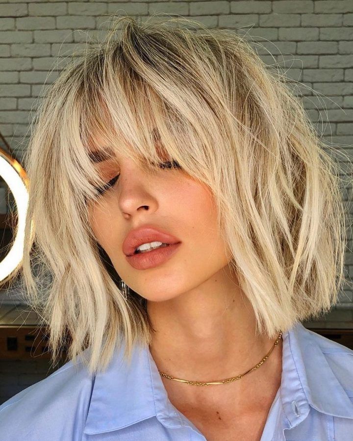 20 Best Elongated Feathered Bangs Hairstyles with Edgy Mob