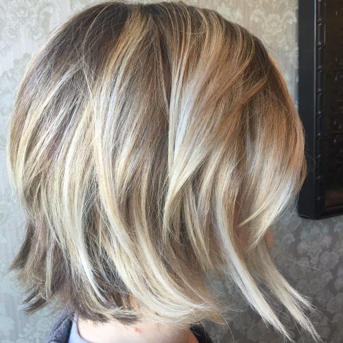 Subtle Dirty Blonde Angled Bob Hairstyles (Photo 2 of 20)