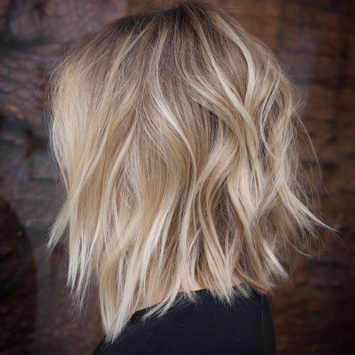 Thick Feathered Blonde Lob Hairstyles (Photo 5 of 20)