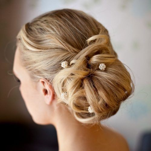 Buns To The Side Wedding Hairstyles (Photo 7 of 15)