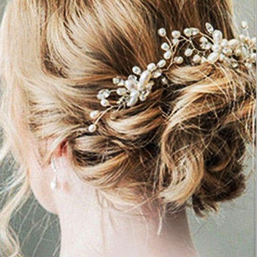 Large Curly Bun Bridal Hairstyles With Beaded Clip (Photo 11 of 20)