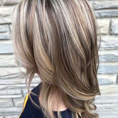 Soft Layers And Side Tuck Blonde Hairstyles (Photo 11 of 20)