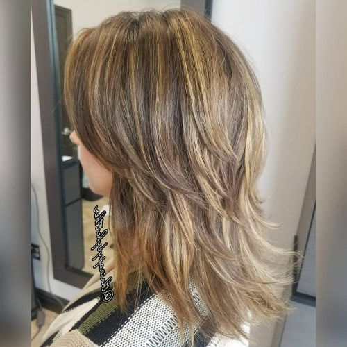 Soft Layers And Side Tuck Blonde Hairstyles (Photo 17 of 20)