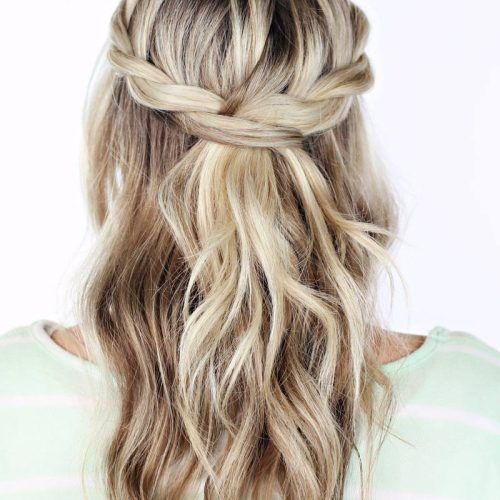 Twisted And Pinned Half Up Wedding Hairstyles (Photo 14 of 20)
