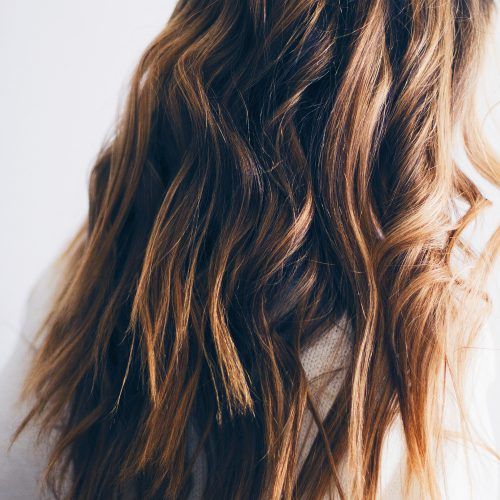 Messy Hairstyles With Beachy Waves (Photo 16 of 20)