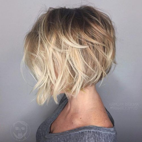 Casual Bright Waves Blonde Hairstyles With Bangs (Photo 18 of 20)