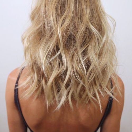 Soft Waves Blonde Hairstyles With Platinum Tips (Photo 12 of 20)