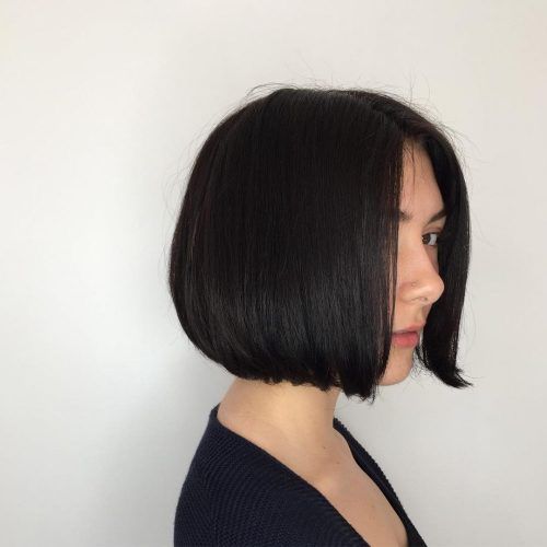 Jaw-Length Inverted Curly Brunette Bob Hairstyles (Photo 8 of 20)