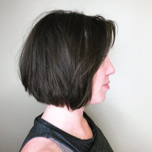 Jaw-Length Inverted Curly Brunette Bob Hairstyles (Photo 18 of 20)