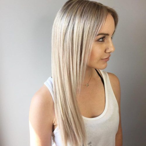 Platinum Tresses Blonde Hairstyles With Shaggy Cut (Photo 19 of 20)