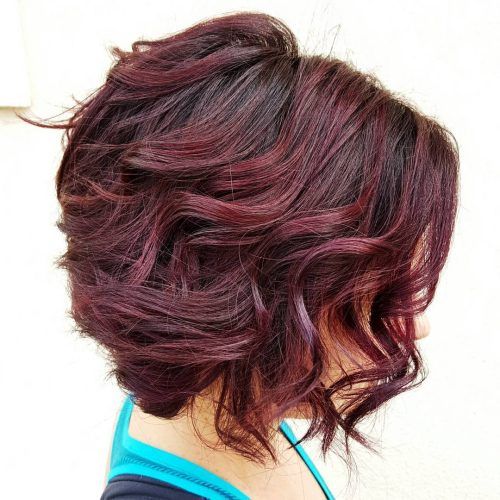 Angled Brunette Bob Hairstyles With Messy Curls (Photo 15 of 20)
