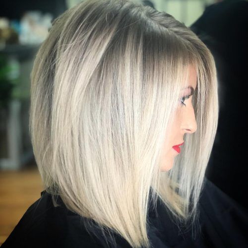Thick Feathered Blonde Lob Hairstyles (Photo 12 of 20)