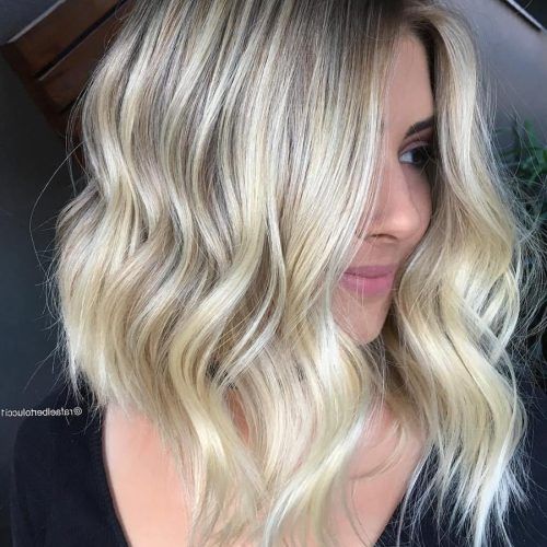 Angled Wavy Lob Blonde Hairstyles (Photo 20 of 20)