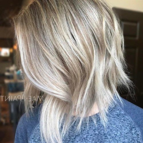 Dynamic Tousled Blonde Bob Hairstyles With Dark Underlayer (Photo 2 of 20)