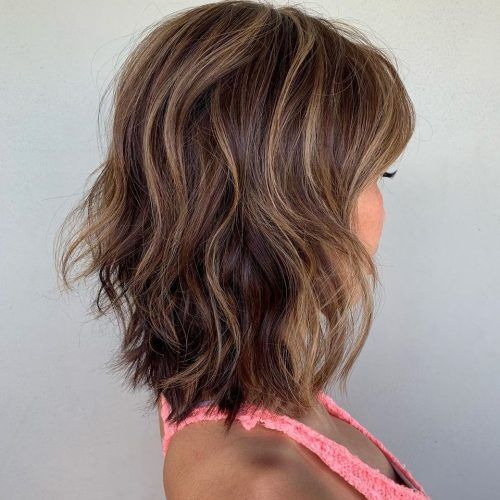 Medium Haircuts With Chunky Swoopy Layers (Photo 10 of 20)