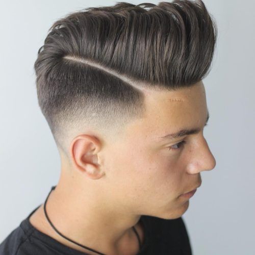 Mohawk Haircuts On Curls With Parting (Photo 5 of 20)