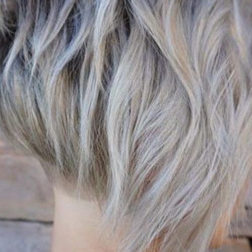Sophisticated Wavy Ash-Blonde Pixie Bob Hairstyles (Photo 14 of 20)