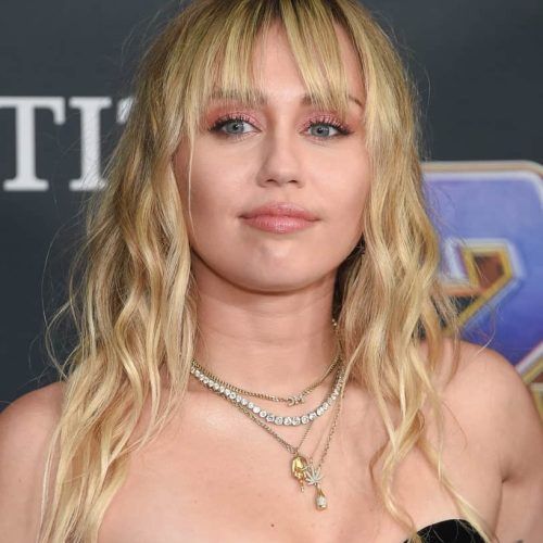 Long Curly Blonde Shag Haircuts With Bangs (Photo 11 of 20)