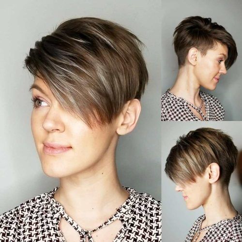 Messy Spiky Pixie Haircuts With Asymmetrical Bangs (Photo 11 of 20)