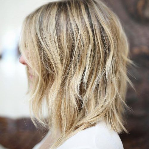 Thick Feathered Blonde Lob Hairstyles (Photo 10 of 20)