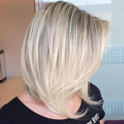 Lovely Golden Blonde Haircuts With Swoopy Layers (Photo 12 of 20)