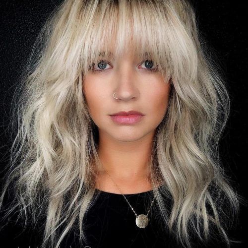 Wispy Layered Blonde Haircuts With Bangs (Photo 18 of 20)