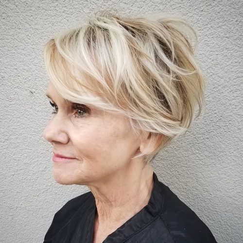 Messy Highlighted Pixie Haircuts With Long Side Bangs (Photo 14 of 20)