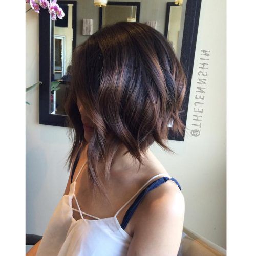 Edgy Brunette Bob Hairstyles With Glossy Waves (Photo 7 of 20)