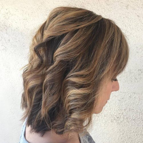 Layered With A Flip For Long Hairstyles (Photo 12 of 20)