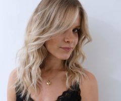 20 Photos Medium Hairstyles with Bangs and Layers