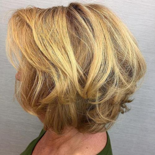 Pixie Bob Hairstyles With Golden Blonde Feathers (Photo 7 of 20)