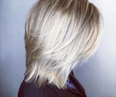 2024 Popular Textured Bronde Bob Hairstyles with Silver Balayage