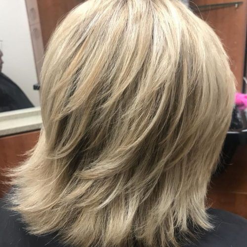Thick Feathered Blonde Lob Hairstyles (Photo 1 of 20)
