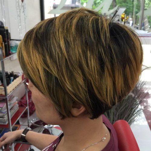 Pixie Bob Hairstyles With Golden Blonde Feathers (Photo 1 of 20)