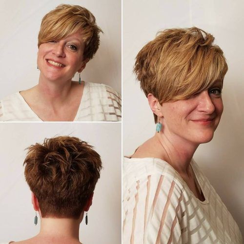 Messy Spiky Pixie Haircuts With Asymmetrical Bangs (Photo 14 of 20)